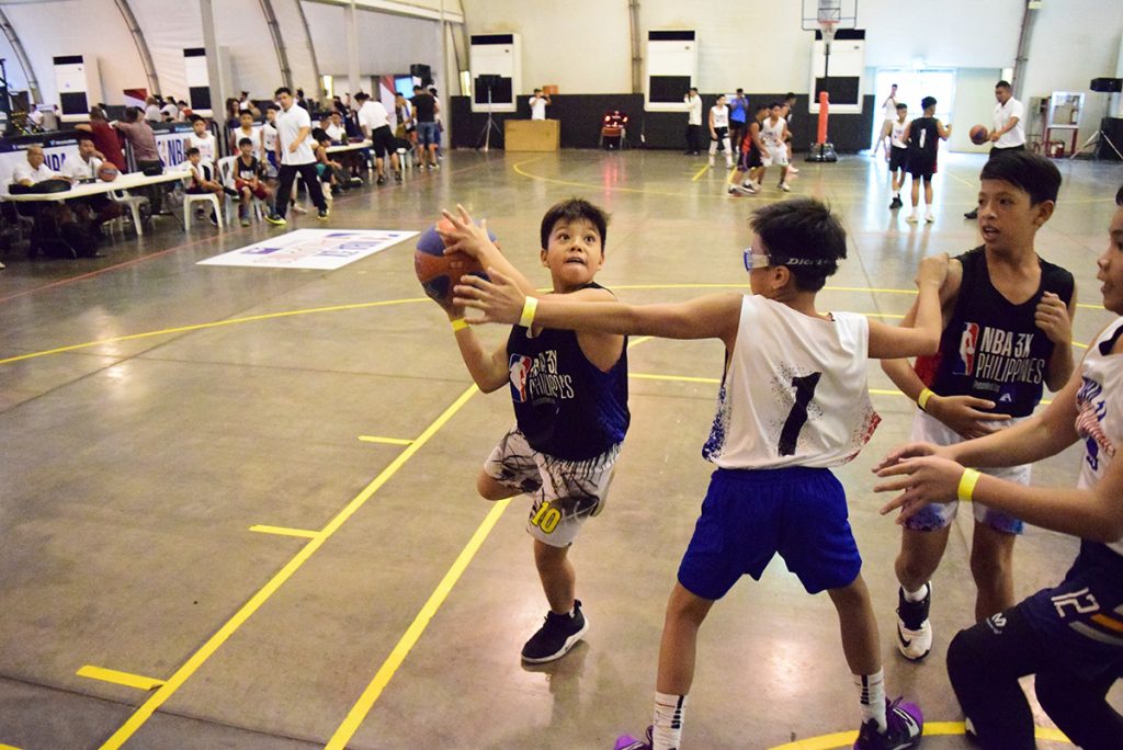 ALL HEART. Boys U13 Division players give their all in the semifinals.